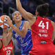 Candace Parker, No. 3 of the Chicago Sky, shoots between Chelsea Gray, No. 12, and Kiah Stokes, No. 41, of the Las Vegas Aces at Wintrust Arena on September 05, 2021 in Chicago, Illinois.